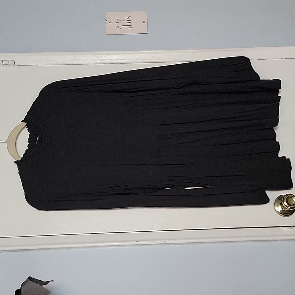 Peplum knit mockneck top